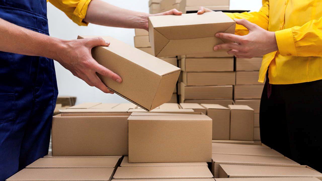 WhoThis Is For img Courier team handling and organizing cardboard delivery boxes